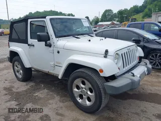 2013 Jeep Wrangler Sahara z VIN 1C4AJWBG5DL507768, wystawiony jako IAAI lot #42426900 z przebiegiem 132 511 mil mil oraz . Historia ofert i sprzedaży dostępna na DreamBid. Obrazek 1.