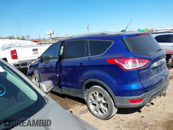 2016 Ford Escape Titanium with VIN 1FMCU0J95GUC41632, listed as a IAAI auction lot 41692040 with 144,834 mi miles. Bid and sale history available at carsss.com. Image 14.