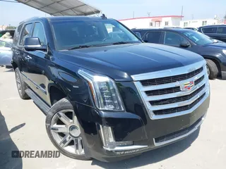 2020 Cadillac Escalade Luxury z VIN 1GYS3BKJ0LR129965, wystawiony jako IAAI lot #42084752 z przebiegiem 133 390 mil mil oraz . Historia ofert i sprzedaży dostępna na DreamBid. Obrazek 1.