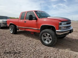 1997 Chevrolet Silverado 1500 with VIN 2GCEK19RXV1278018, listed as a Copart auction lot 49117675 with 218,026 mi miles and Salvage Title. Bid and sale history available at DreamBid. Image 4.