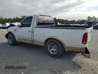 1999 Ford F-150 XL with VIN 1FTRF17L8XNA75702, listed as a Copart auction lot 69868104 with Not provided miles and Salvage title. Bid and sale history available at DreamBid. Image 2.