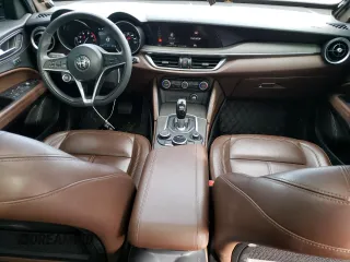 2018 Alfa Romeo Stelvio Ti z VIN ZASFAKBN6J7B80421, wystawiony jako Copart lot #43687775 z przebiegiem 81 426 mil mil oraz Czysty tytuł • Clean title. Historia ofert i sprzedaży dostępna na DreamBid. Obrazek 8.