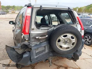 2006 Honda CR-V LX with VIN SHSRD68506U404787, listed as a IAAI auction lot 42001551 with 136,534 mi miles. Bid and sale history available at carsss.com. Image 6.