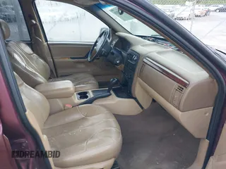 2000 Jeep Grand Cherokee Laredo with VIN 1J4G248S0YC351033, listed as a IAAI auction lot 42165830 with 145,351 mi miles and . Bid and sale history available at DreamBid. Image 5.