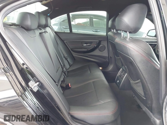 2014 BMW 3 Series 328i with VIN WBA3C1G53ENR49917, listed as a IAAI auction lot 42116704 with 148,630 mi miles and . Bid and sale history available at carsss.com. Image 8.