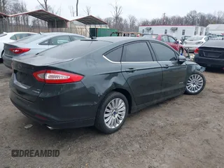 2015 Ford Fusion SE Hybrid with VIN 3FA6P0LU0FR242452, listed as a IAAI auction lot 41790218 with 163,741 mi miles. Bid and sale history available at carsss.com. Image 4.