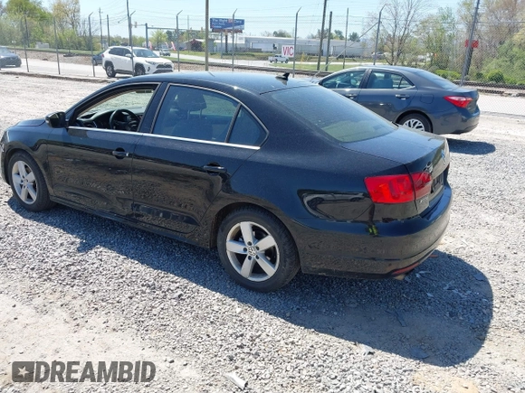 2014 Volkswagen Jetta TDI w/Premium/Nav с VIN 3VWLL7AJXEM435467, выставлен на аукционе IAAI как лот 42056011 с пробегом 167 534 миль миль и . История ставок и продаж доступна на DreamBid. Изображение 3.