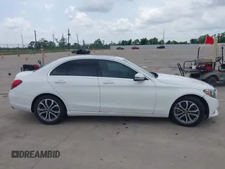 2018 Mercedes-Benz C 300 with VIN 55SWF4JB0JU252994, listed as a IAAI auction lot 42113897 with 72,533 mi miles and . Bid and sale history available at DreamBid. Image 13.