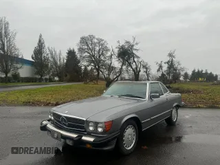 1987 Mercedes-Benz 560 SL with VIN WDBBA48D4HA059822, listed as a Copart auction lot 89218625 with 128,288 mi miles and Clean Title. Bid and sale history available at DreamBid. Image 2.