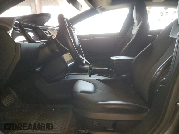 2016 Tesla Model S 70 with VIN 5YJSA1E15GF159542, listed as a Copart auction lot 58253965 with 70,373 mi miles and Salvage title. Bid and sale history available at DreamBid. Image 7.