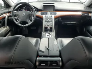 2006 Acura RL z VIN JH4KB16596C004369, wystawiony jako Copart lot #54237425 z przebiegiem 191 708 mil mil oraz Szkody całkowita. Historia ofert i sprzedaży dostępna na DreamBid. Obrazek 8.