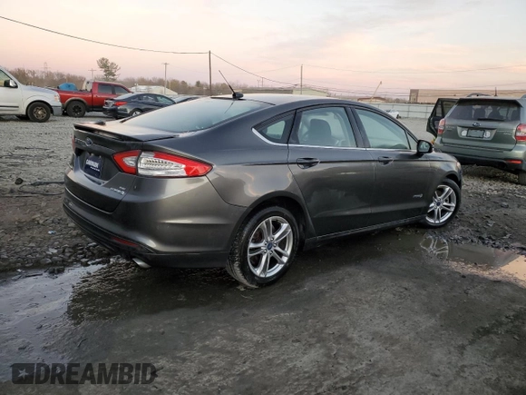 2016 Ford Fusion SE Hybrid with VIN 3FA6P0LU5GR127038, listed as a Copart auction lot 79508174 with 56,555 mi miles and Salvage Title. Bid and sale history available at carsss.com. Image 3.