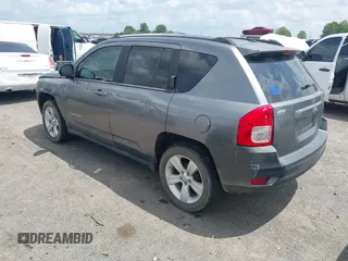 2011 Jeep Compass Latitude with VIN 1J4NT1FB4BD246549, listed as a IAAI auction lot 42156761 with 232,739 mi miles. Bid and sale history available at carsss.com. Image 3.