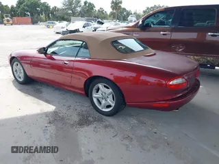 1997 Jaguar XK with VIN SAJGX274XVC004952, listed as a IAAI auction lot 42211023 with 109,889 mi miles and . Bid and sale history available at DreamBid. Image 3.