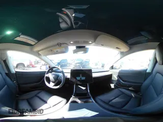 2020 Tesla Model 3 Standard Range Plus with VIN 5YJ3E1EA0LF739462, listed as a IAAI auction lot 42081889 with 65,254 mi miles. Bid and sale history available at carsss.com. Image 22.