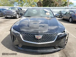 2023 Cadillac CT4 Luxury with VIN 1G6DK5RK4P0107157, listed as a Copart auction lot 71153704 with 12,336 mi miles and Salvage Title. Bid and sale history available at carsss.com. Image 5.