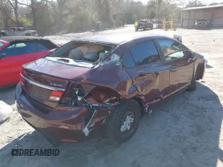 2015 Honda Civic Sedan LX with VIN 19XFB2F56FE244819, listed as a IAAI auction lot 41744828 with 128,500 mi miles. Bid and sale history available at carsss.com. Image 4.