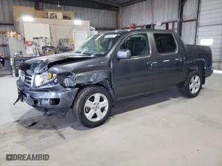 2013 Honda Ridgeline RTL with VIN 5FPYK1F57DB016202, listed as a Copart auction lot 48349095 with 35,880 mi miles and Salvage Title. Bid and sale history available at carsss.com. Image 1.
