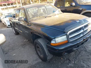 2000 Dodge Dakota Sport with VIN 1B7GG22N3YS697498, listed as a IAAI auction lot 40923958 with 1 mi miles. Bid and sale history available at carsss.com. Image 1.