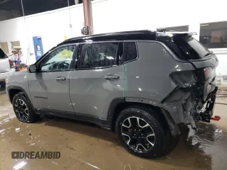 2020 Jeep Compass Trailhawk with VIN 3C4NJDDB0LT215553, listed as a Copart auction lot 45045165 with 90,702 mi miles and Salvage Title. Bid and sale history available at carsss.com. Image 2.