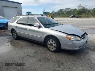2003 Ford Taurus z VIN 1FAHP59U73A217826, wystawiony jako Copart lot #80059964 z przebiegiem 315 560 mil mil oraz Szkody całkowita. Historia ofert i sprzedaży dostępna na DreamBid. Obrazek 4.