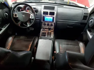 2008 Dodge Nitro R/T with VIN 1D8GU58628W129571, listed as a Copart auction lot 48071265 with 195,904 mi miles and Salvage Title. Bid and sale history available at DreamBid. Image 8.