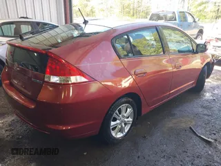 2010 Honda Insight EX z VIN JHMZE2H7XAS001280, wystawiony jako IAAI lot #41982398 z przebiegiem 142 434 mil mil oraz . Historia ofert i sprzedaży dostępna na DreamBid. Obrazek 4.