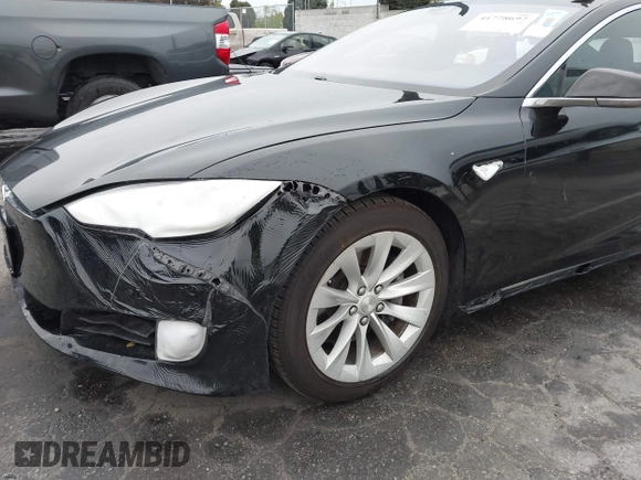 2016 Tesla Model S 70 with VIN 5YJSA1E1XGF154577, listed as a IAAI auction lot 41778697 with 62,630 mi miles and . Bid and sale history available at DreamBid. Image 6.