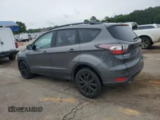 2017 Ford Escape SE z VIN 1FMCU9GD1HUB35003, wystawiony jako Copart lot #56502385 z przebiegiem 74 409 mil mil oraz Szkoda całkowita • Salvage title. Historia ofert i sprzedaży dostępna na DreamBid. Obrazek 2.