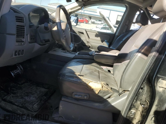 2005 Nissan Titan LE with VIN 1N6AA07B15N555054, listed as a Copart auction lot 42713855 with 213,169 mi miles and Salvage Title. Bid and sale history available at carsss.com. Image 7.