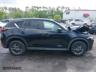 2019 Mazda CX-5 Touring with VIN JM3KFACM6K0672294, listed as a IAAI auction lot 42003210 with 50,127 mi miles. Bid and sale history available at carsss.com. Image 12.