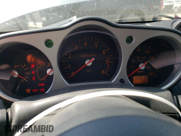 2005 Nissan 350Z with VIN JN1AZ34D05M606703, listed as a Copart auction lot 69631414 with 133,519 mi miles and Salvage Title. Bid and sale history available at DreamBid. Image 9.