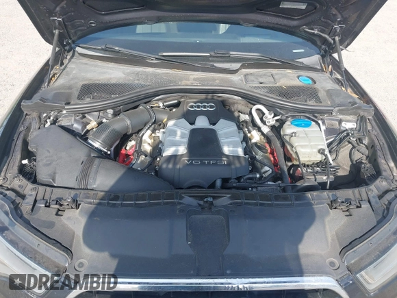 2015 Audi A6 3.0T Prestige with VIN WAUHGAFC3FN011654, listed as a IAAI auction lot 42104153 with 166,719 mi miles. Bid and sale history available at carsss.com. Image 10.