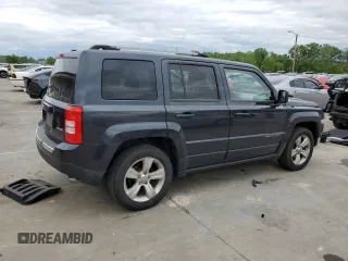 2014 Jeep Patriot Limited with VIN 1C4NJPCB9ED900811, listed as a Copart auction lot 58061115 with 230,415 mi miles and Salvage title. Bid and sale history available at DreamBid. Image 3.