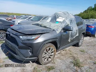 2022 Toyota RAV4 XLE Premium with VIN 2T3C1RFV5NC195230, listed as a IAAI auction lot 40495536 with 30,824 mi miles and . Bid and sale history available at DreamBid. Image 2.