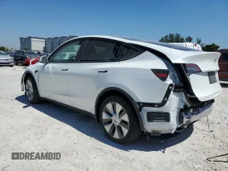 2023 Tesla Model Y Long Range with VIN 7SAYGDEEXPF770800, listed as a Copart auction lot 48324515 with 25,205 mi miles and Salvage Title. Bid and sale history available at DreamBid. Image 2.