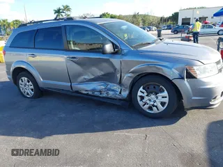 2016 Dodge Journey SE with VIN 3C4PDCAB2GT194810, listed as a IAAI auction lot 41559149 with 104,551 mi miles and . Bid and sale history available at DreamBid. Image 6.