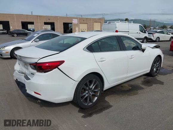 2016 Mazda Mazda6 i Grand Touring with VIN JM1GJ1W51G1444867, listed as a IAAI auction lot 41988597 with 86,844 mi miles. Bid and sale history available at carsss.com. Image 4.