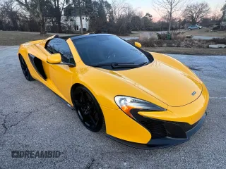 2015 McLaren 650S z VIN SBM11FAA4FW005324, wystawiony jako Copart lot #43651815 z przebiegiem 28 798 mil mil oraz Tytuł czysty. Historia ofert i sprzedaży dostępna na DreamBid. Obrazek 1.