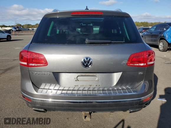 2015 Volkswagen Touareg Sport with VIN WVGEF9BP9FD007657, listed as a Copart auction lot 49432045 with 61,668 mi miles and Salvage title. Bid and sale history available at DreamBid. Image 6.