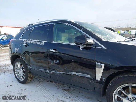2014 Cadillac SRX Performance Collection with VIN 3GYFNFE39ES661344, listed as a IAAI auction lot 41619214 with NaN miles. Bid and sale history available at carsss.com. Image 13.