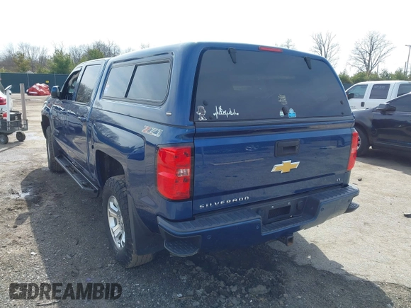 2017 Chevrolet Silverado 1500 LT with VIN 3GCUKREC5HG363503, listed as a IAAI auction lot 41833304 with 133,130 mi miles and . Bid and sale history available at DreamBid. Image 3.