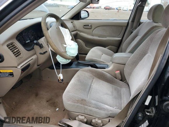 2001 Kia Optima LX z VIN KNAGD126315028712, wystawiony jako Copart lot #85302564 z przebiegiem 81 722 mil mil oraz Nie do naprawy • Non repairable. Historia ofert i sprzedaży dostępna na DreamBid. Obrazek 7.