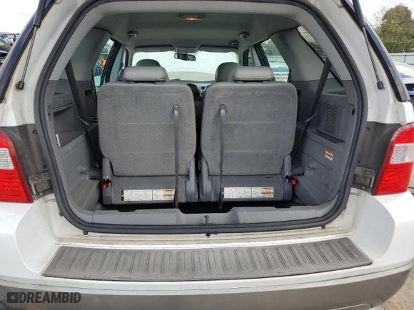 2007 Ford Freestyle SEL with VIN 1FMDK02197GA24604, listed as a Copart auction lot 74915664 with 243,960 mi miles and Salvage Title. Bid and sale history available at carsss.com. Image 13.