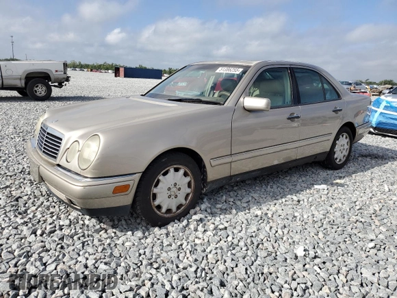 1999 Mercedes-Benz E with VIN WDBJF25H7XA934446, listed as a Copart auction lot 51386255 with 218,439 mi miles and Clean Title. Bid and sale history available at DreamBid. Image 1.