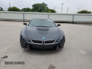 2015 BMW i8 z VIN WBY2Z2C50FV674256, wystawiony jako Copart lot #56895134 z przebiegiem 33 484 mil mil oraz Szkody całkowita. Historia ofert i sprzedaży dostępna na DreamBid. Obrazek 5.