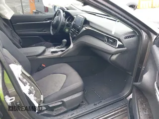 2024 Toyota Camry LE z VIN 4T1C11AK2RU879602, wystawiony jako IAAI lot #42162353 z przebiegiem 6 185 mil mil oraz . Historia ofert i sprzedaży dostępna na DreamBid. Obrazek 5.