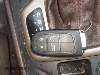 2014 Jeep Cherokee Trailhawk with VIN 1C4PJMBS6EW100500, listed as a IAAI auction lot 41894989 with 131,034 mi miles. Bid and sale history available at carsss.com. Image 11.