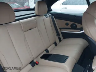 2015 BMW M4 with VIN WBS3U9C5XFJ968082, listed as a IAAI auction lot 41513593 with 57,715 mi miles. Bid and sale history available at carsss.com. Image 8.