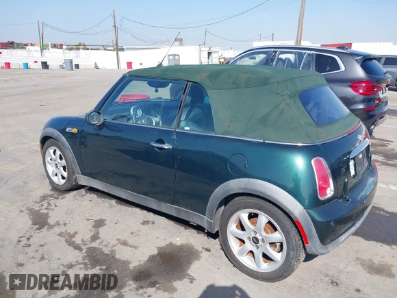 2006 MINI Convertible with VIN WMWRF33566TG15710, listed as a IAAI auction lot 41636955 with Not Provided miles and . Bid and sale history available at DreamBid. Image 3.